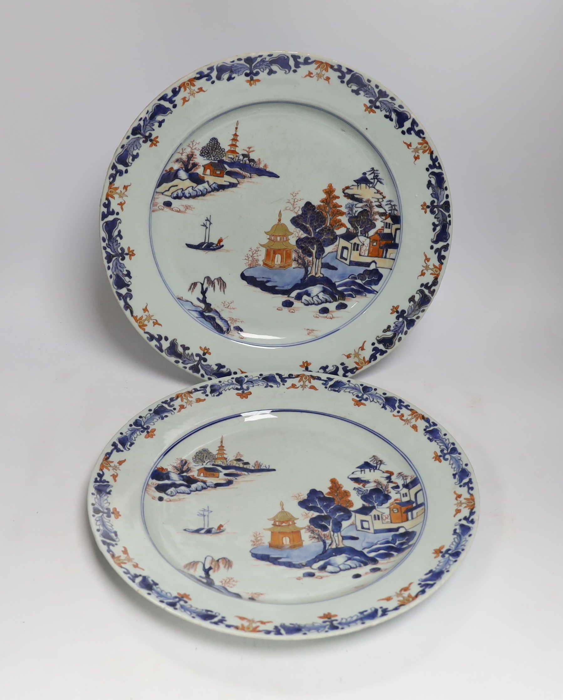 A pair of Chinese Imari landscape dishes, Qianlong period, 35cm diameter